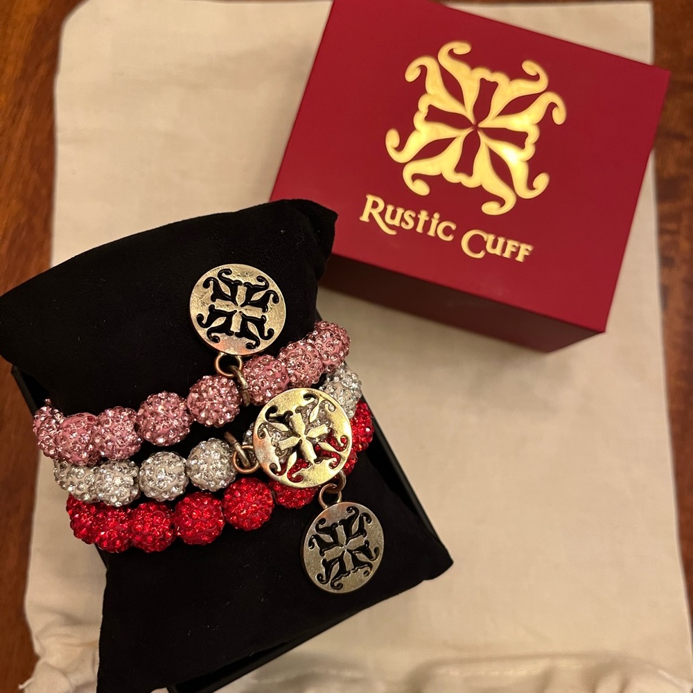 Authentic Rustic Cuff bracelet. “Emerson” sparkle set: red, white, and pink.